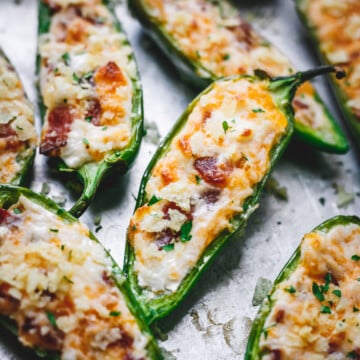 Baked bacon jalapeño poppers topped with crushed chips.