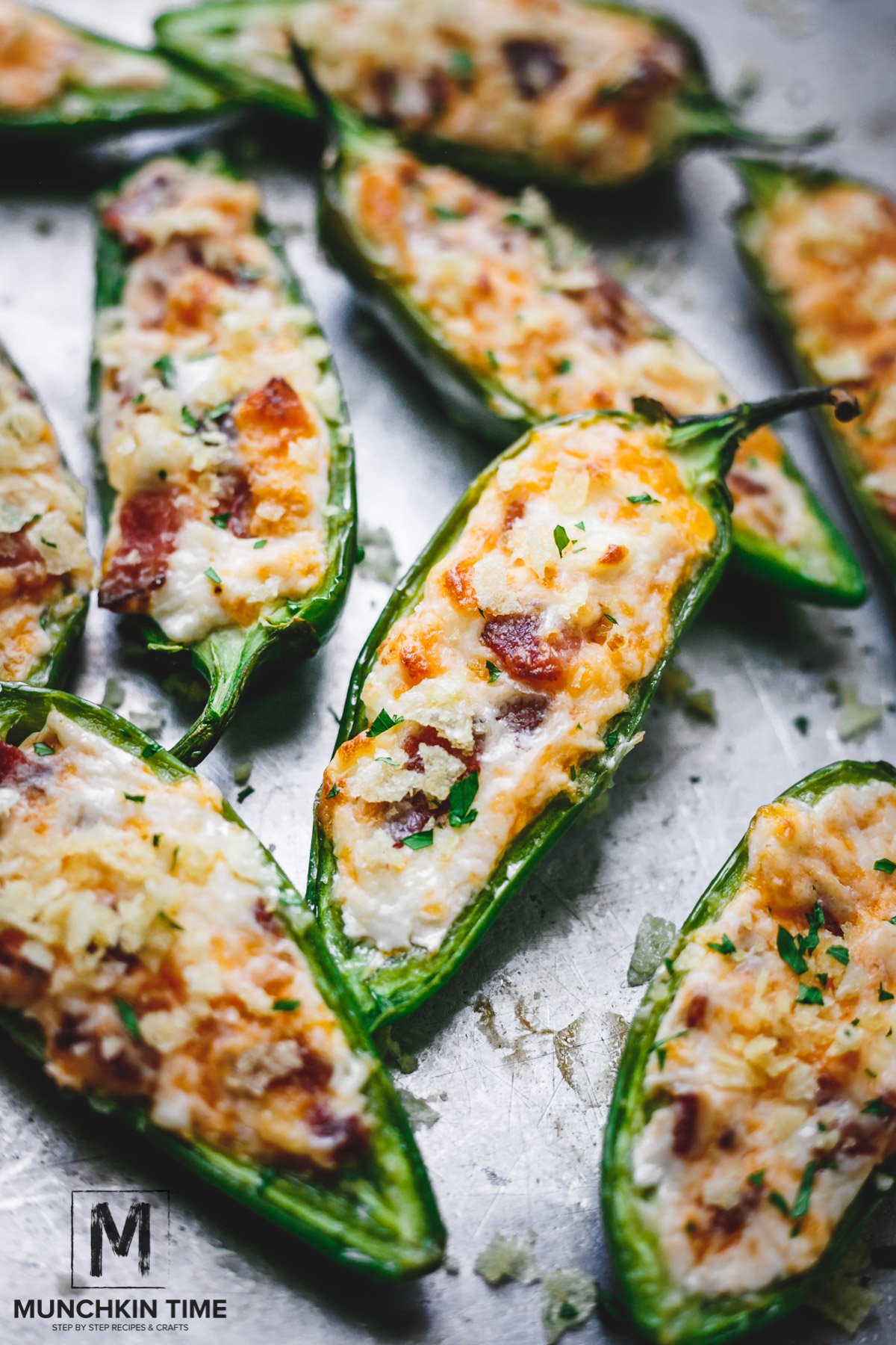 Stuffed jalapeño peppers with cream cheese, bacon & cheddar cheese.