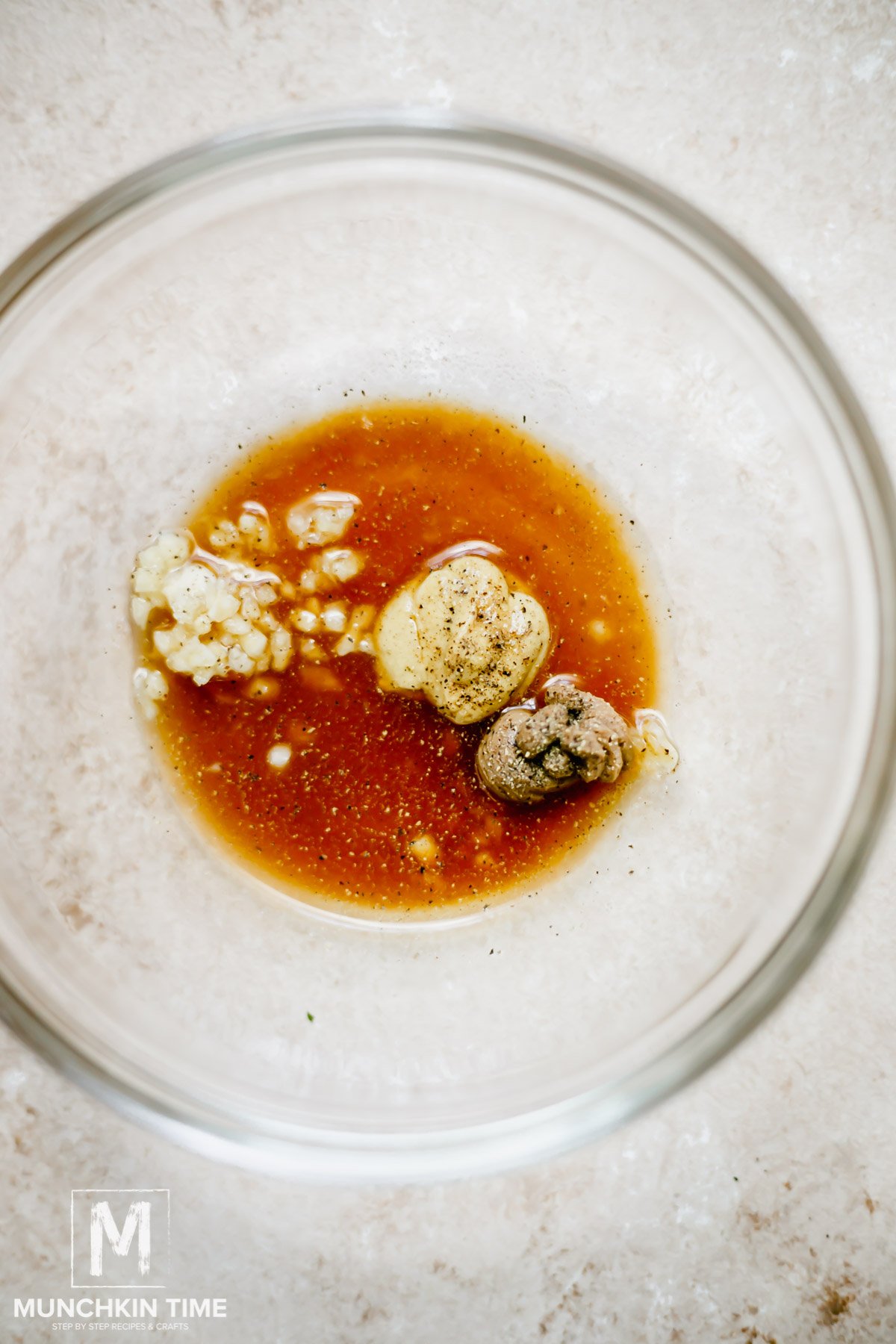 dressing ingredients inside the mixing bowl.