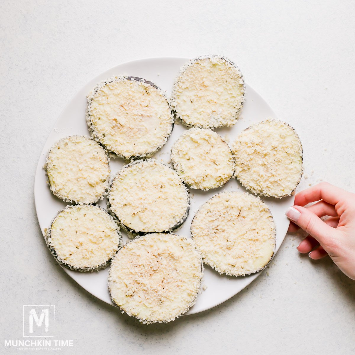 Eggplant coated in flour, egg wash and breadcrumbs. 