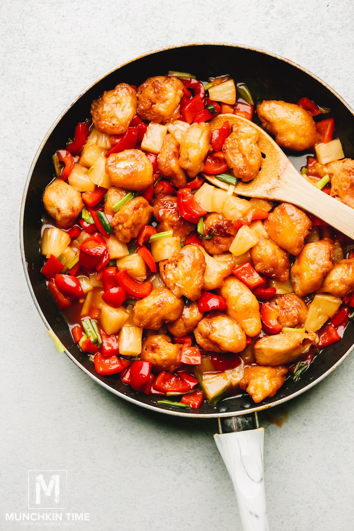 Sweet and Sour Chicken with Pineapple and Peppers is ready to be served.