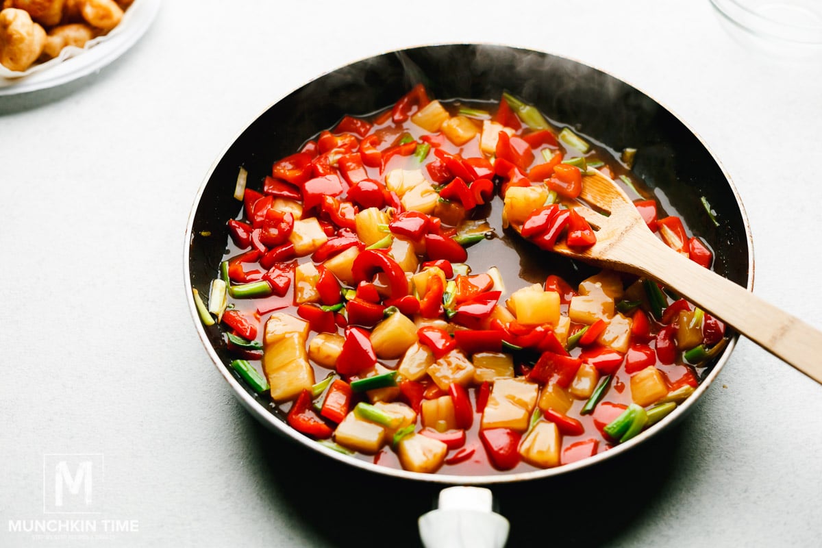 Green onion and pineapple juice added to the sweet and sour sauce. 