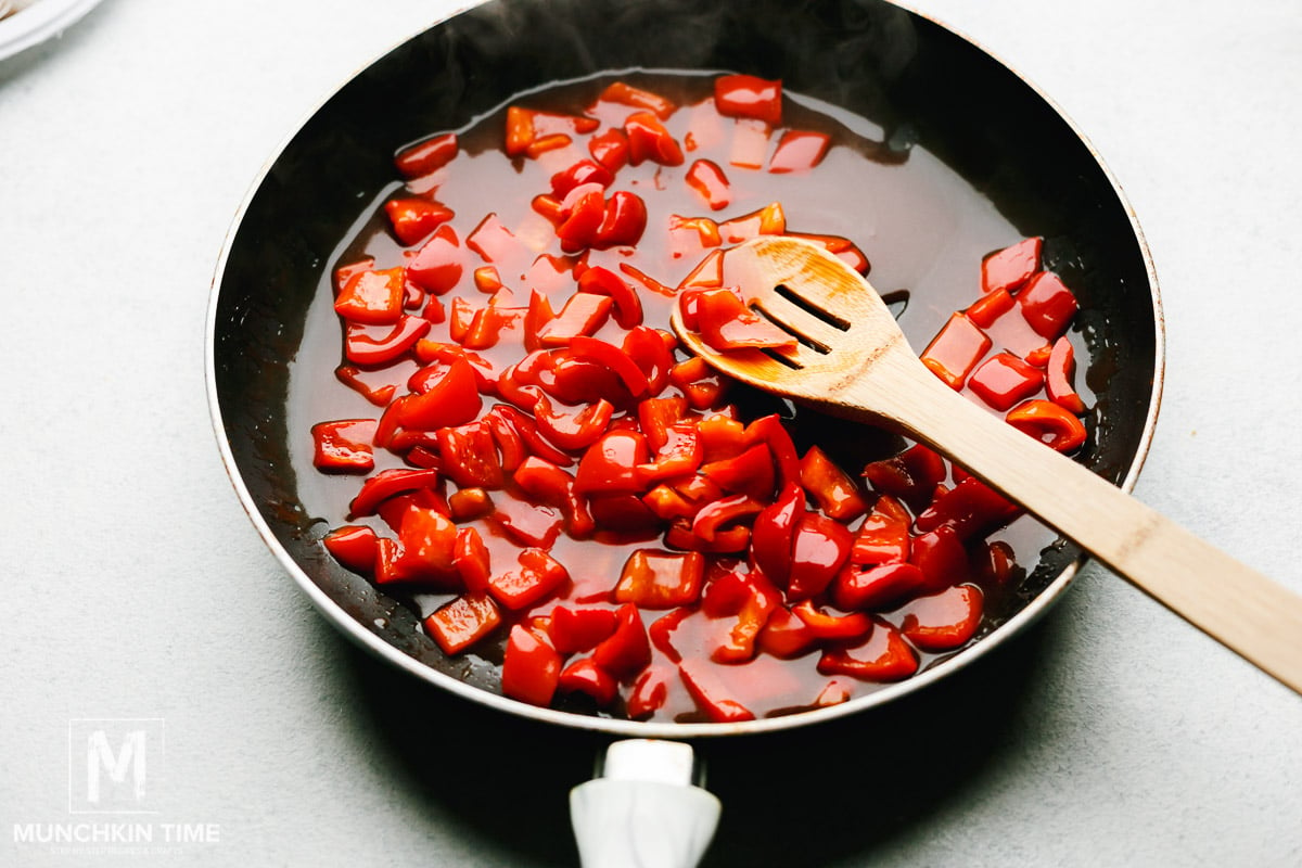 Sweet and sour sauce added to the skillet. The sauce got thick. 