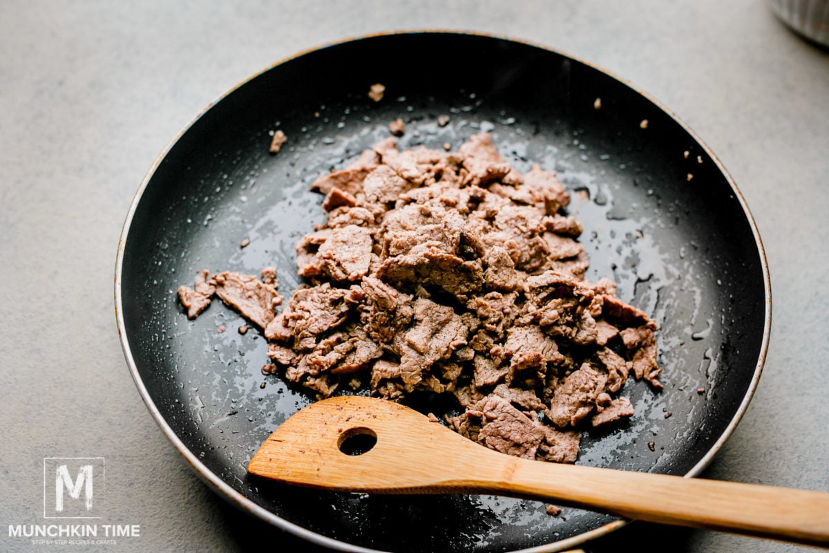 Meat returned to the skillet.