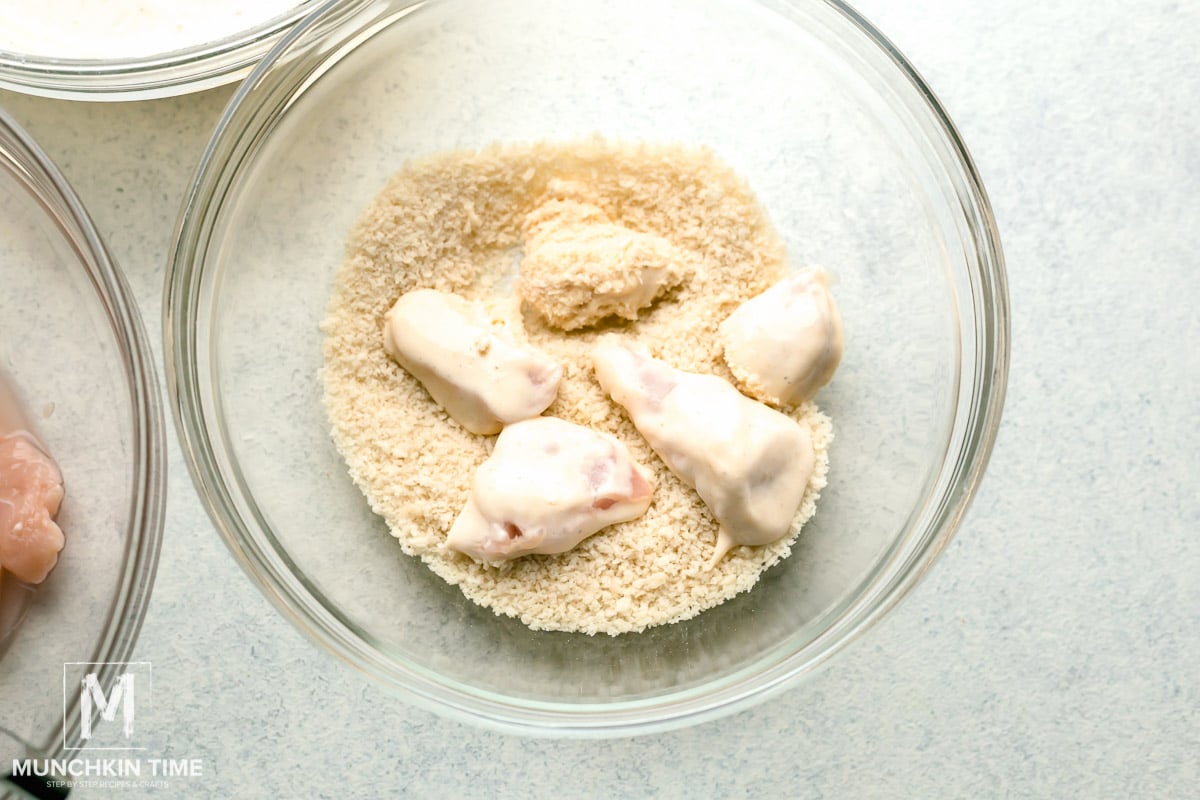 Chicken coated in breadcrumbs. 