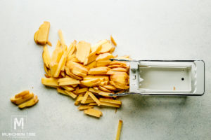 Potato cut into French fries from using vegetable cutter.