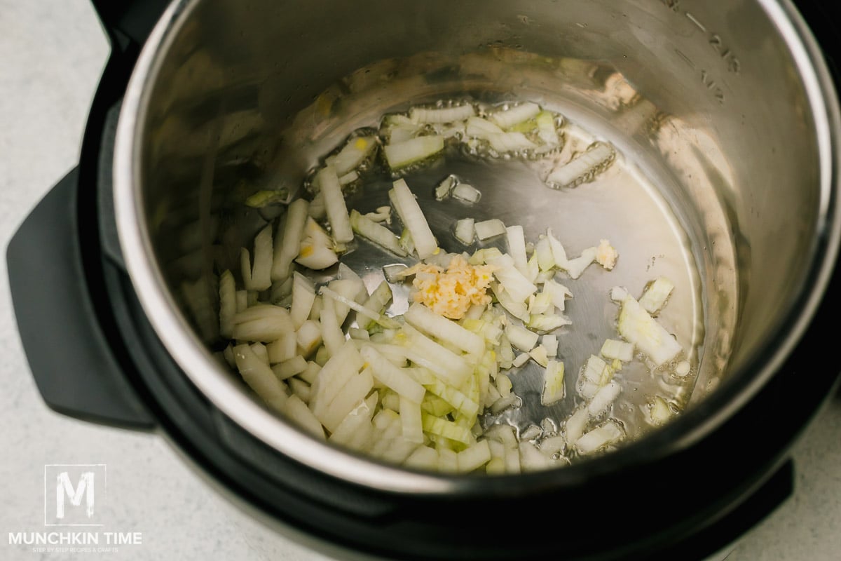 Saute onion & garlic inside instant pot.