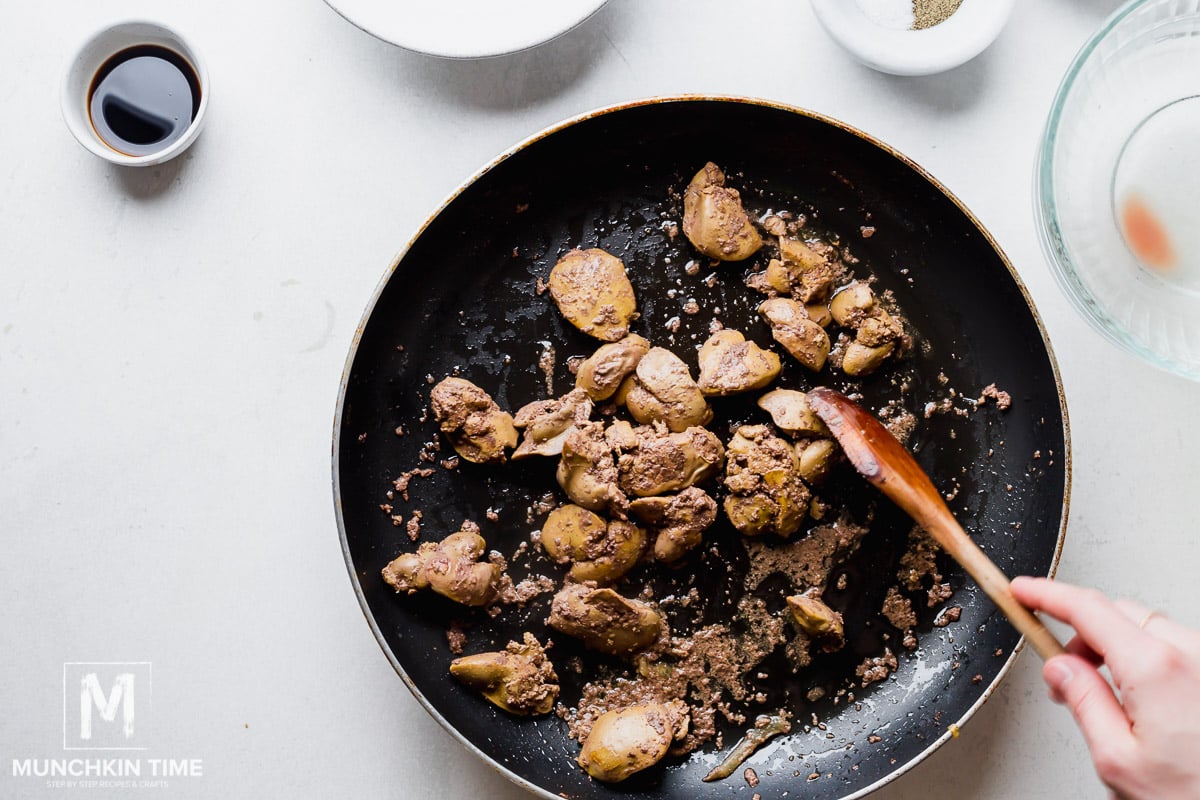 Raw Chicken liver in the skillet.