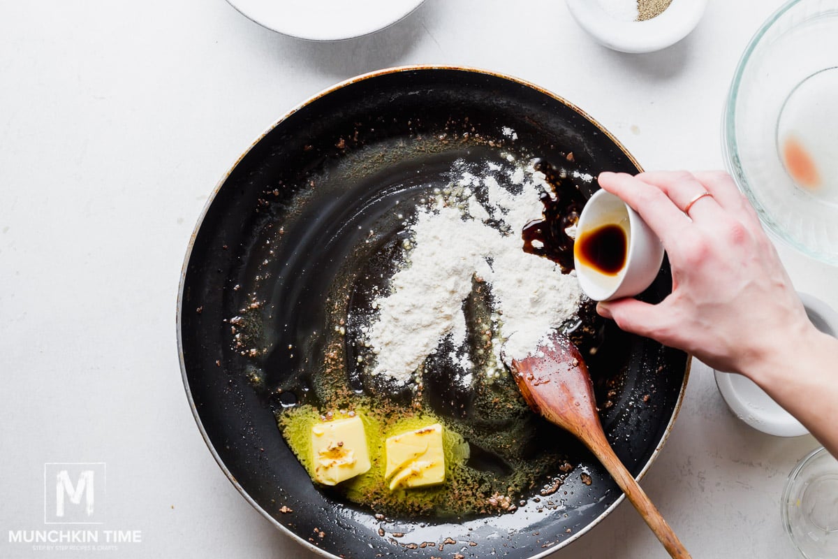 Soy sauce, flour and butter added to the skillet.