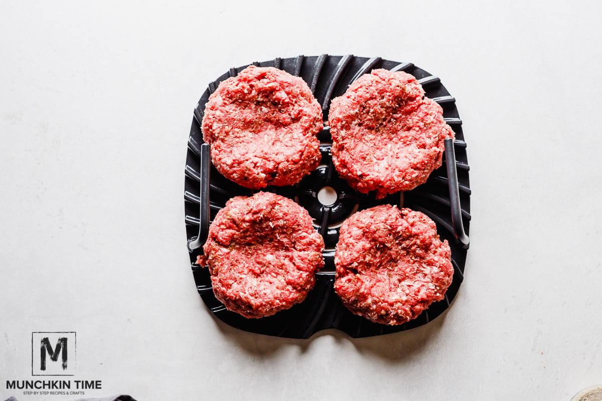 Homemade Burger Recipe with ground beef & ground pork, cheese, lettuce and pickled red onions.