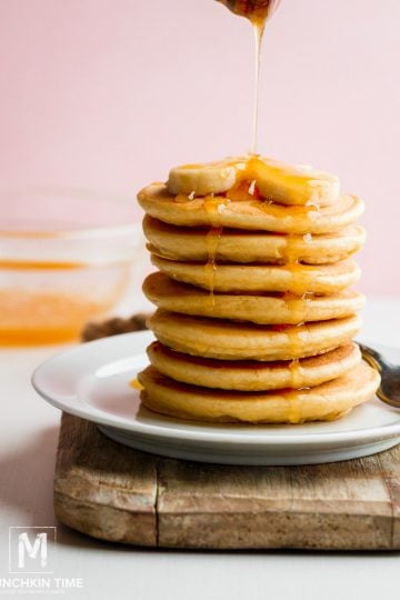 Quick & Easy Buttermilk Pancake Recipe with honey drizzle and banana slices. Delicious & Easy Pancake Recipe from scratch