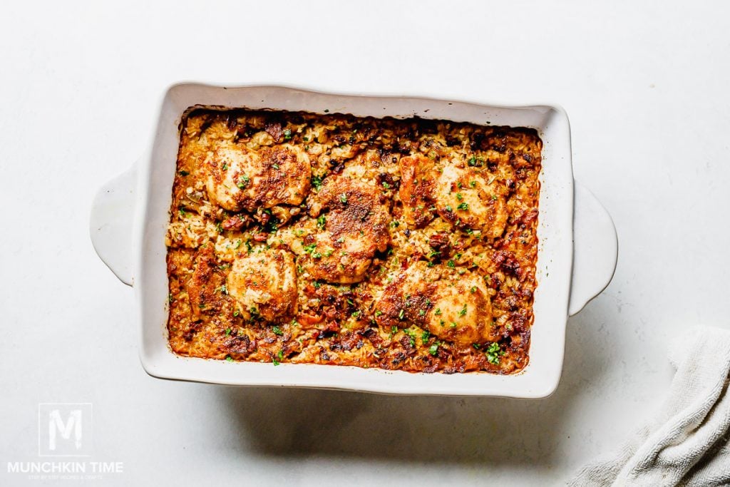 Easy Chicken Thighs and Rice Casserole Recipe (Video) - Munchkin Time