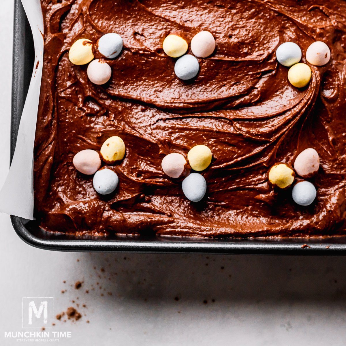 Easy Chocolate Brownie Recipe with Easter eggs chocolate candy.
