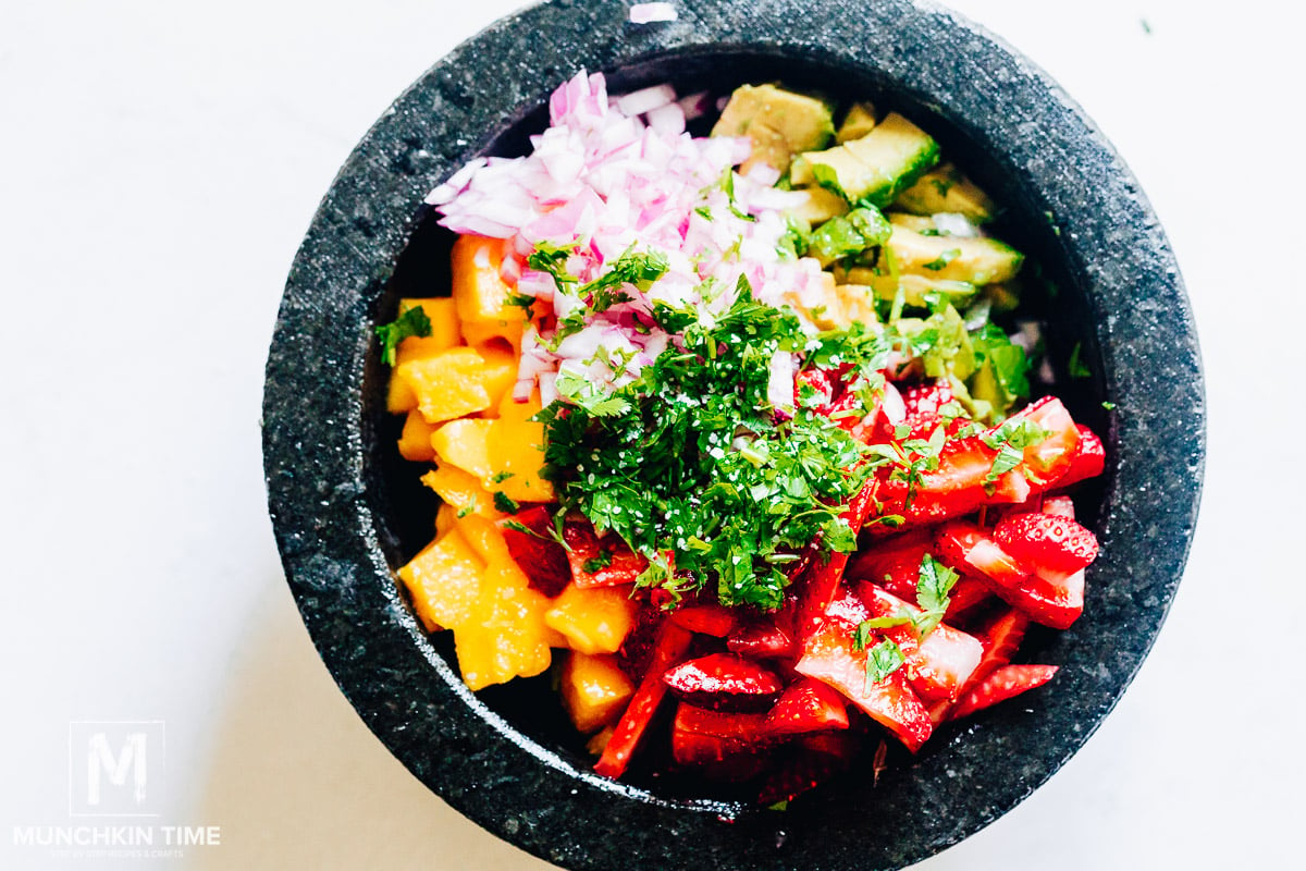 How to make mango salsa, combine all ingredients in a salsa bowl.