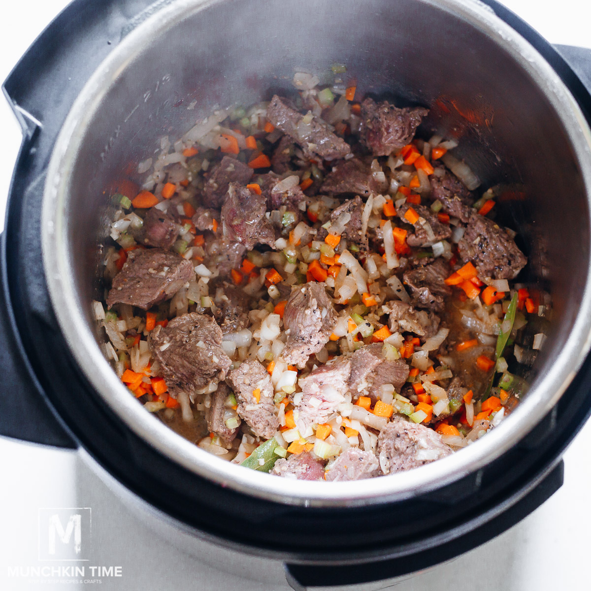 Instant Pot saute veggies with beef.