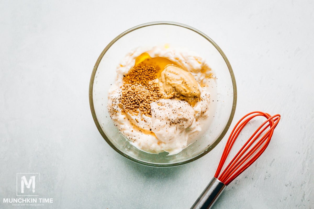 Mayo spread ingredients inside the glass bowl.