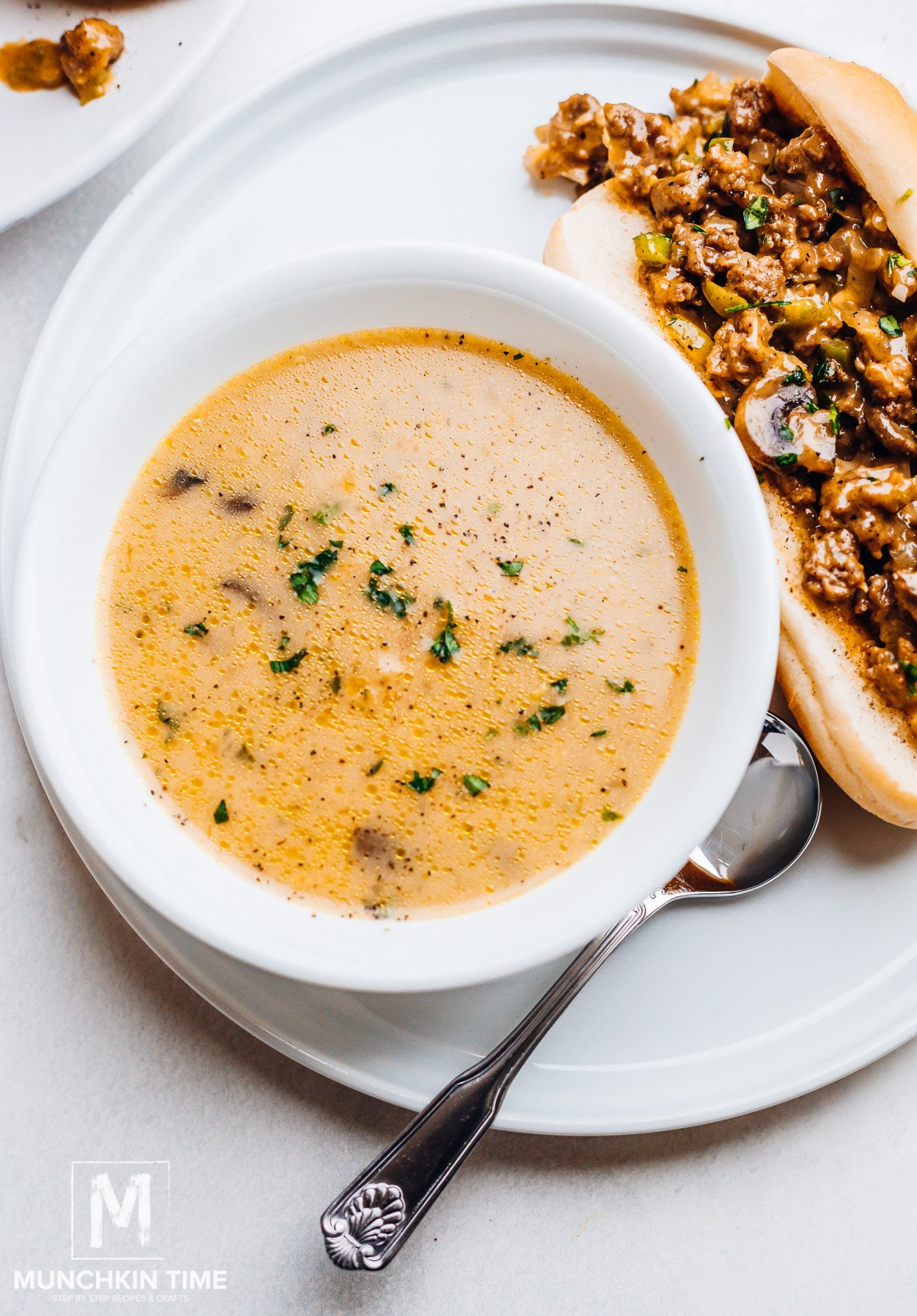 Homemade Cream of Mushroom Soup with Sandwich stuffed with cheesy bread filling.