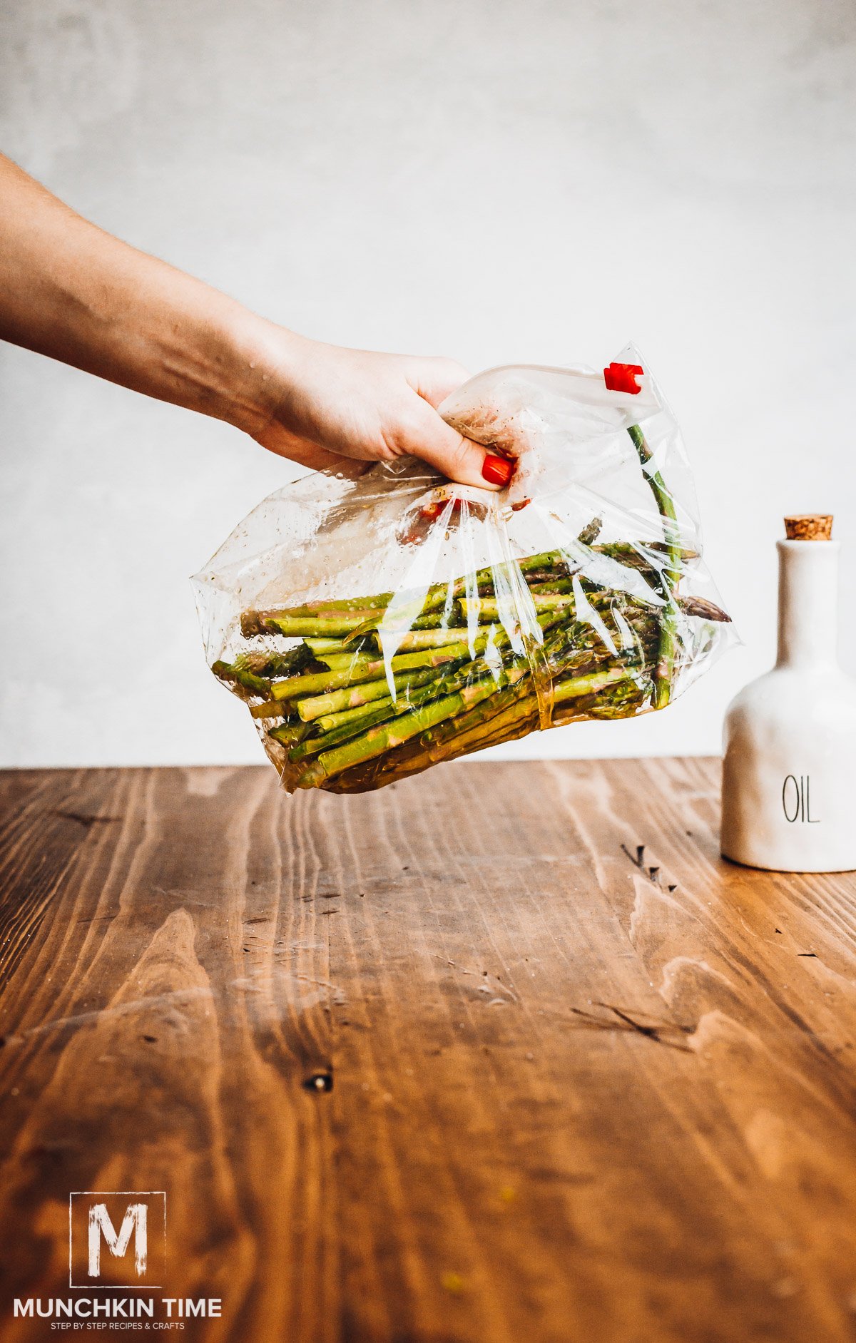 Asparagus marinating in zip bag.