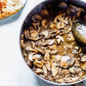 Chicken broth and white wine added to chicken marsala sauce.