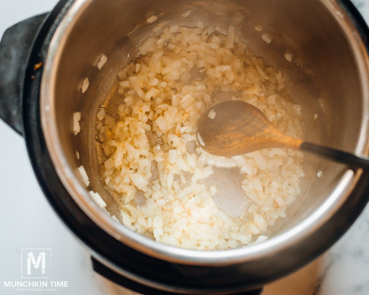 Saute onion in Instant Pot.