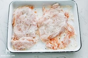 Coat chicken breast with flour mixture
