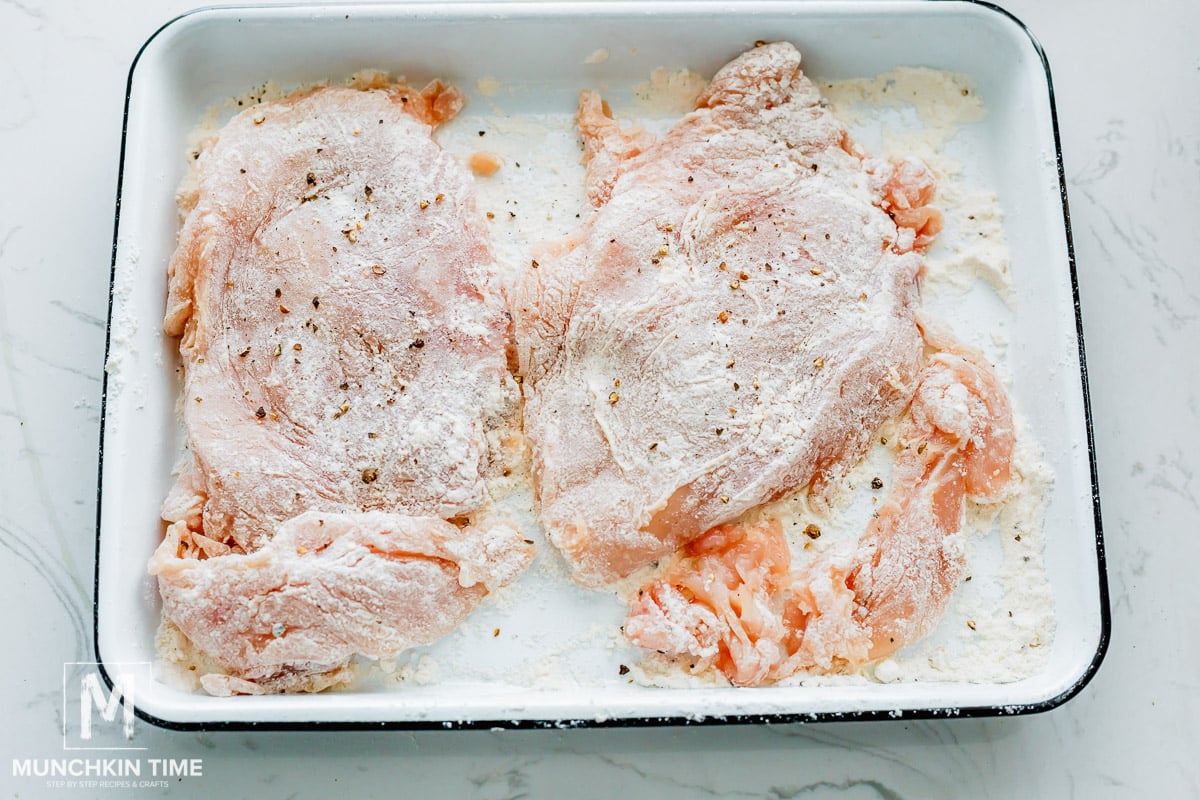 Coat chicken breast with flour mixture