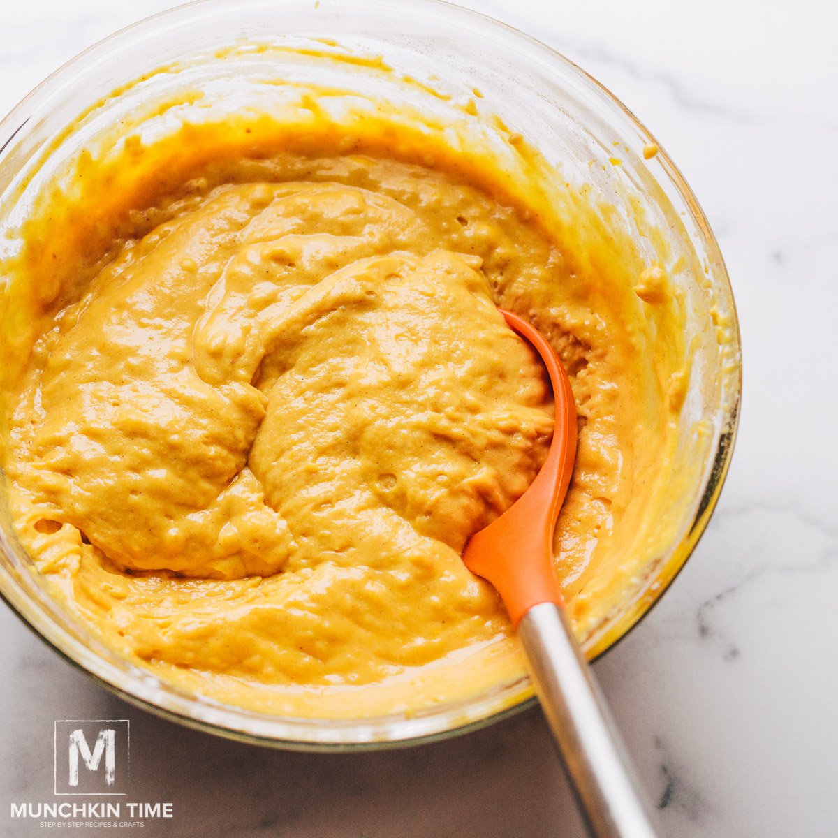 Combine wet ingredients with dry ingredients to make pumpkin waffle batter.