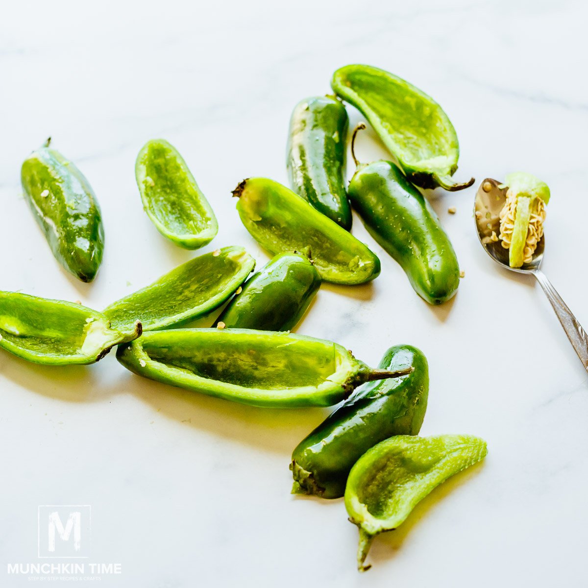 Jalapenos cut in half and seeds removed.