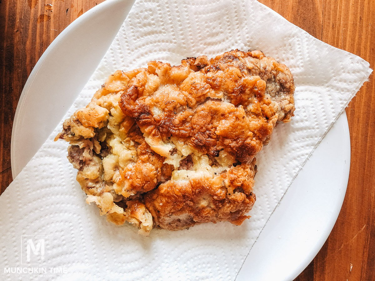 Fried chicken steak on a paper towels.