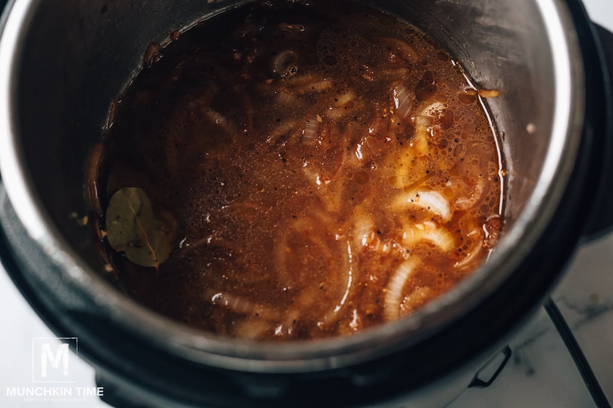 Add broth into instant pot.