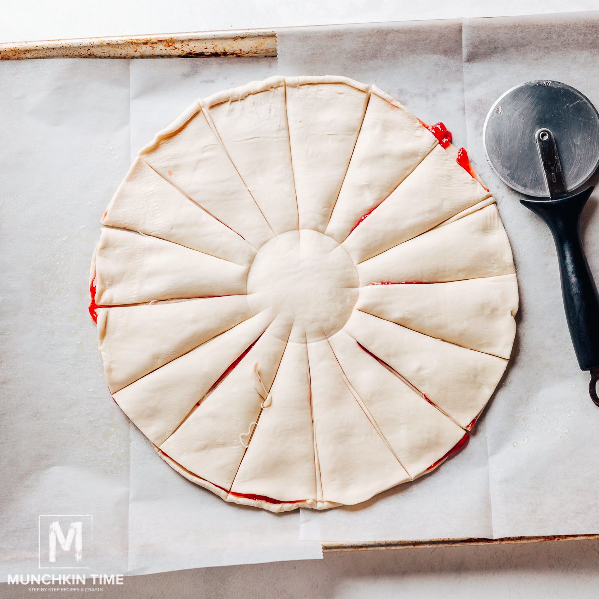 Pastry cut into 16 strips.