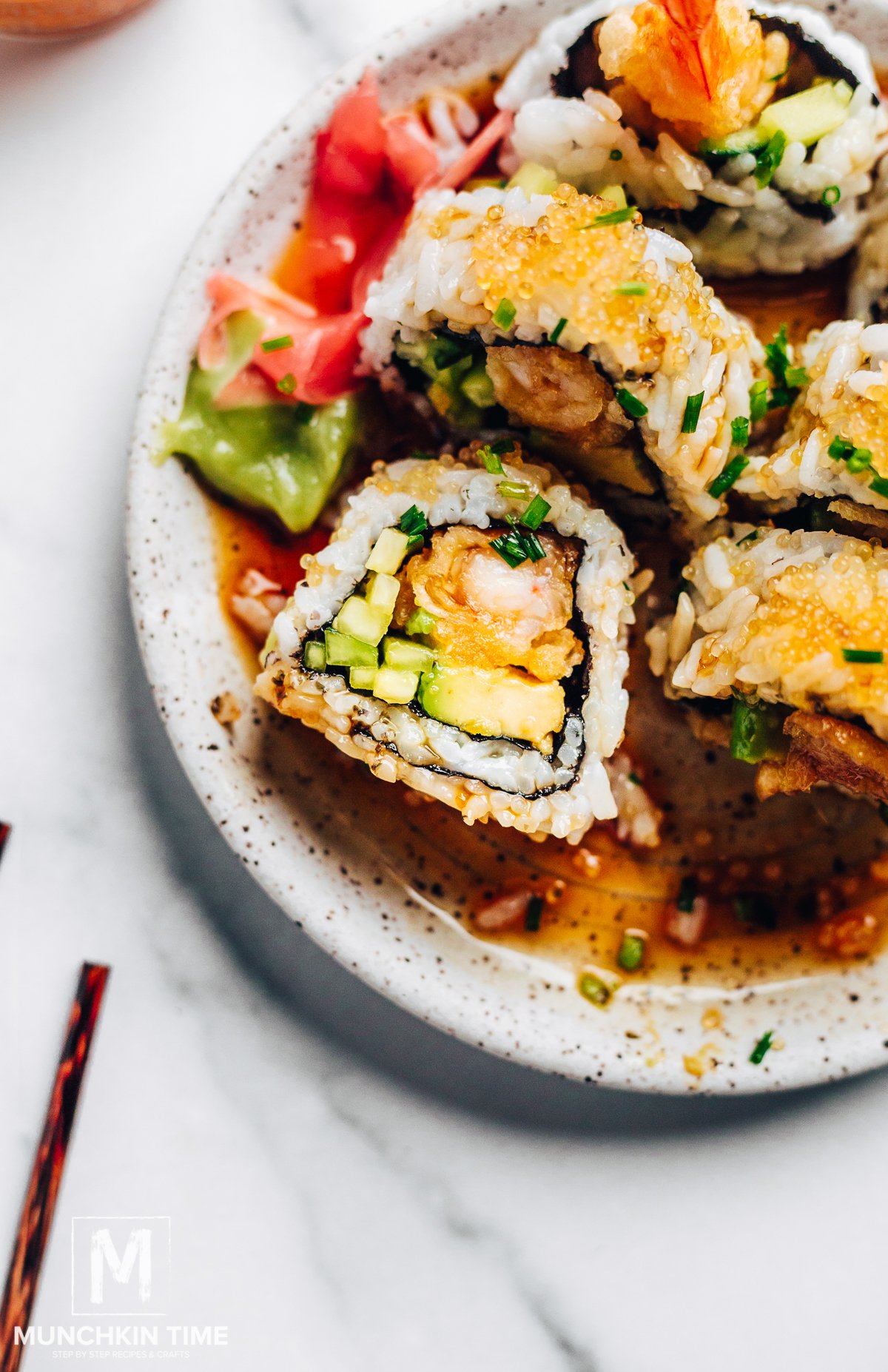 What is a shrimp tempura roll? This is a crunchy and savory sushi roll made with baked and battered shrimp, sushi rice, nori, cucumber, and avocado.