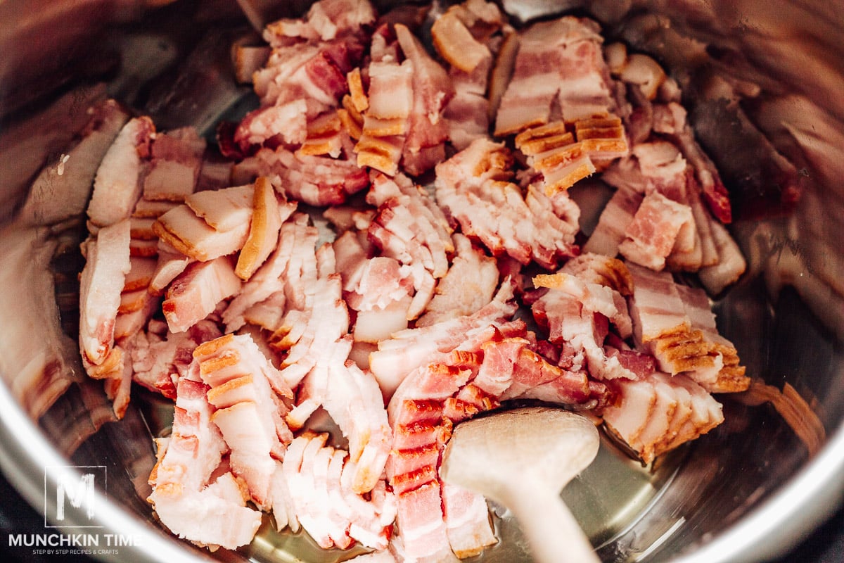 bacon cooking in the pot