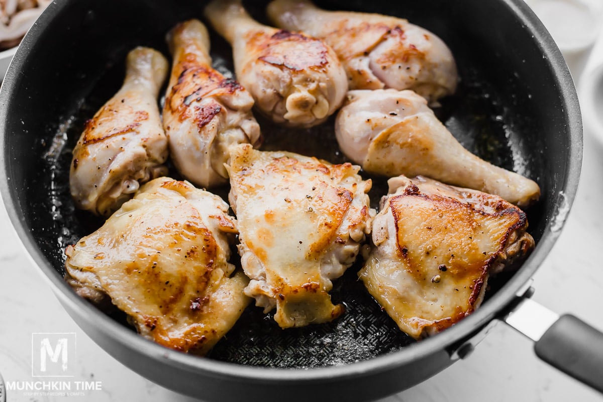 chicken searing in the skillet.