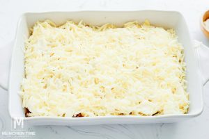 shredded cheese then cover the entire dish