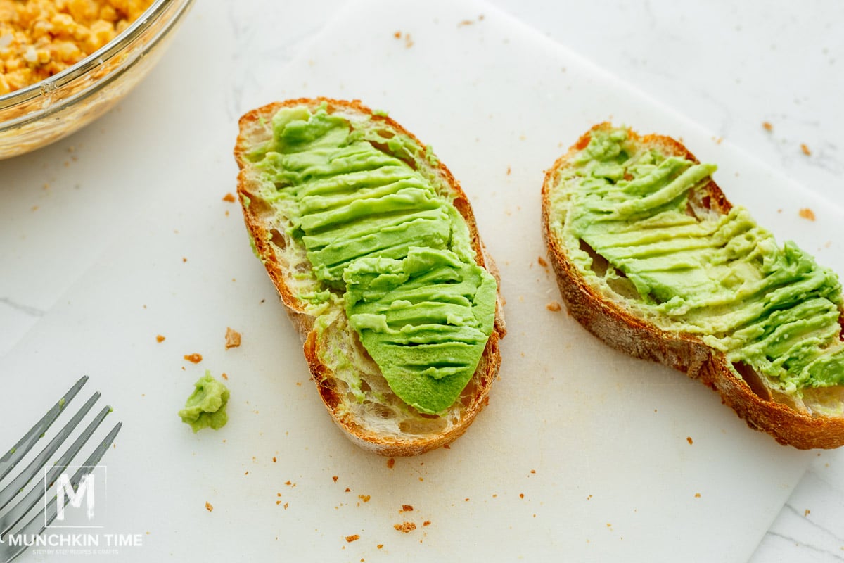 mashed avocado on top of a toast