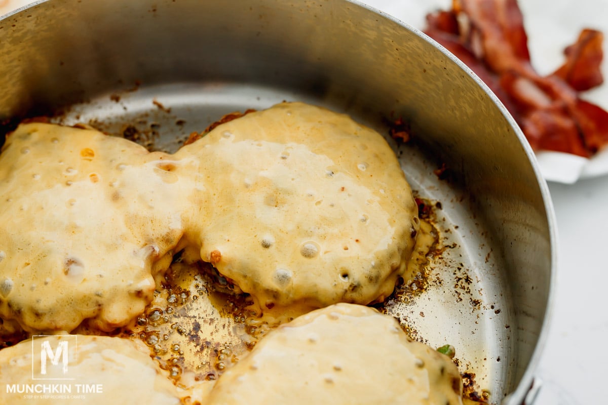 cooking chicken patties in the skillet