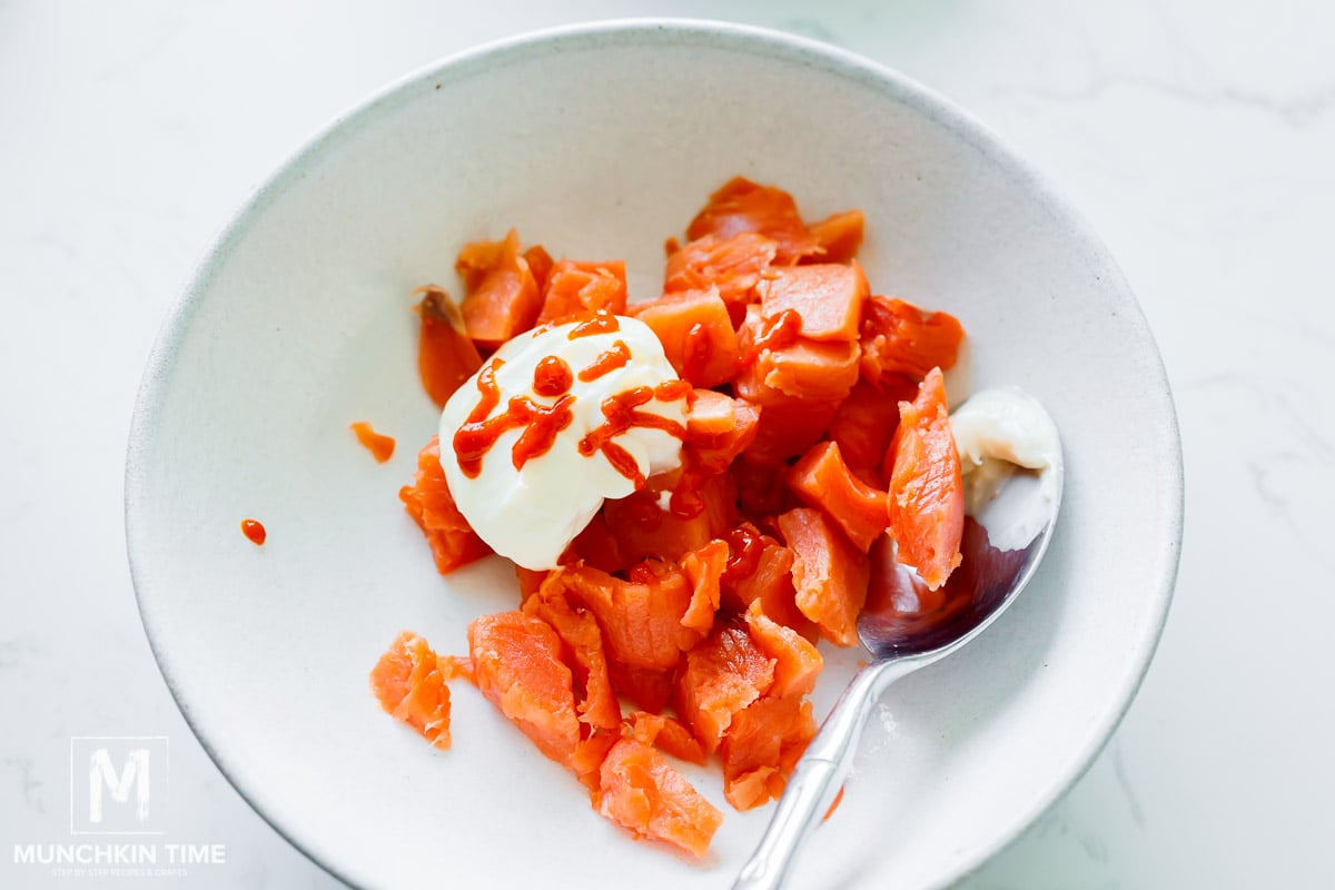 bowl with salmon and sauces