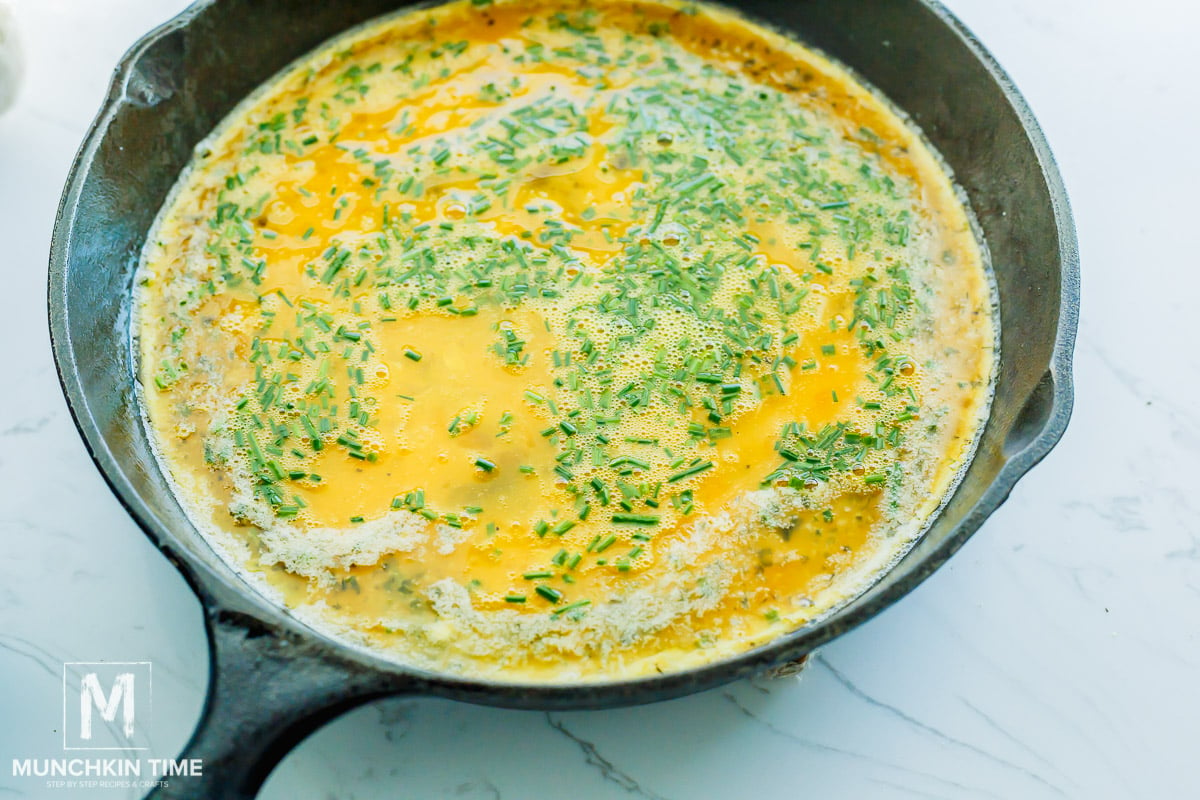 egg mixture inside the skillet