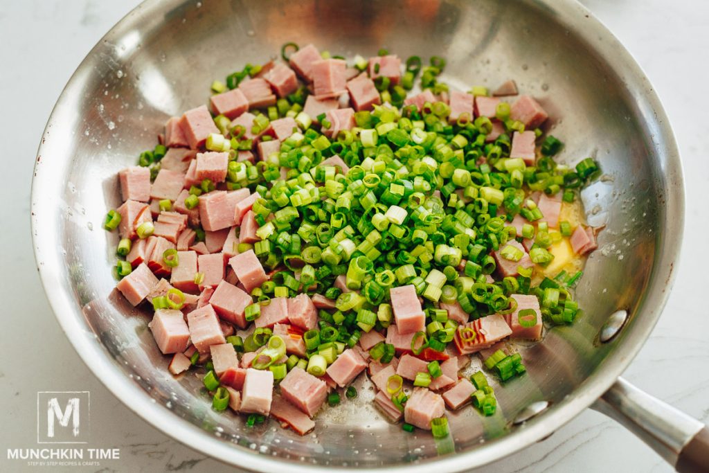 ham and green onion in the skillet