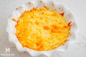 baked potato with cheese in a baking dish