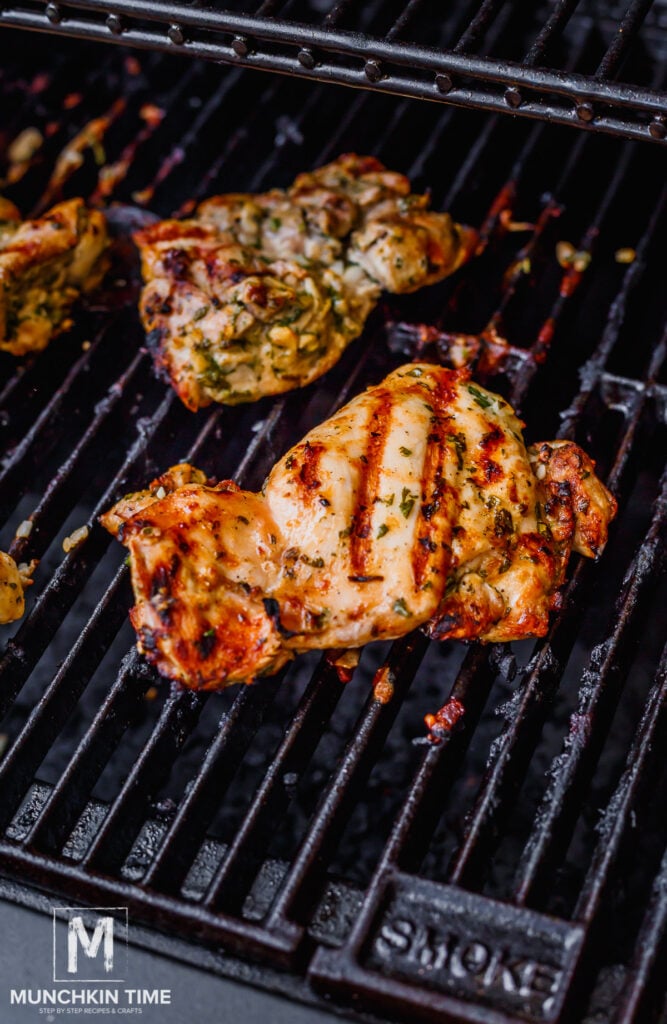 perfectly grilled chicken on the grill.