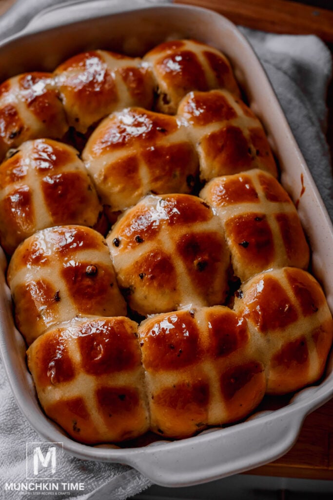Delicious Hot Cross Buns in a baking dish.