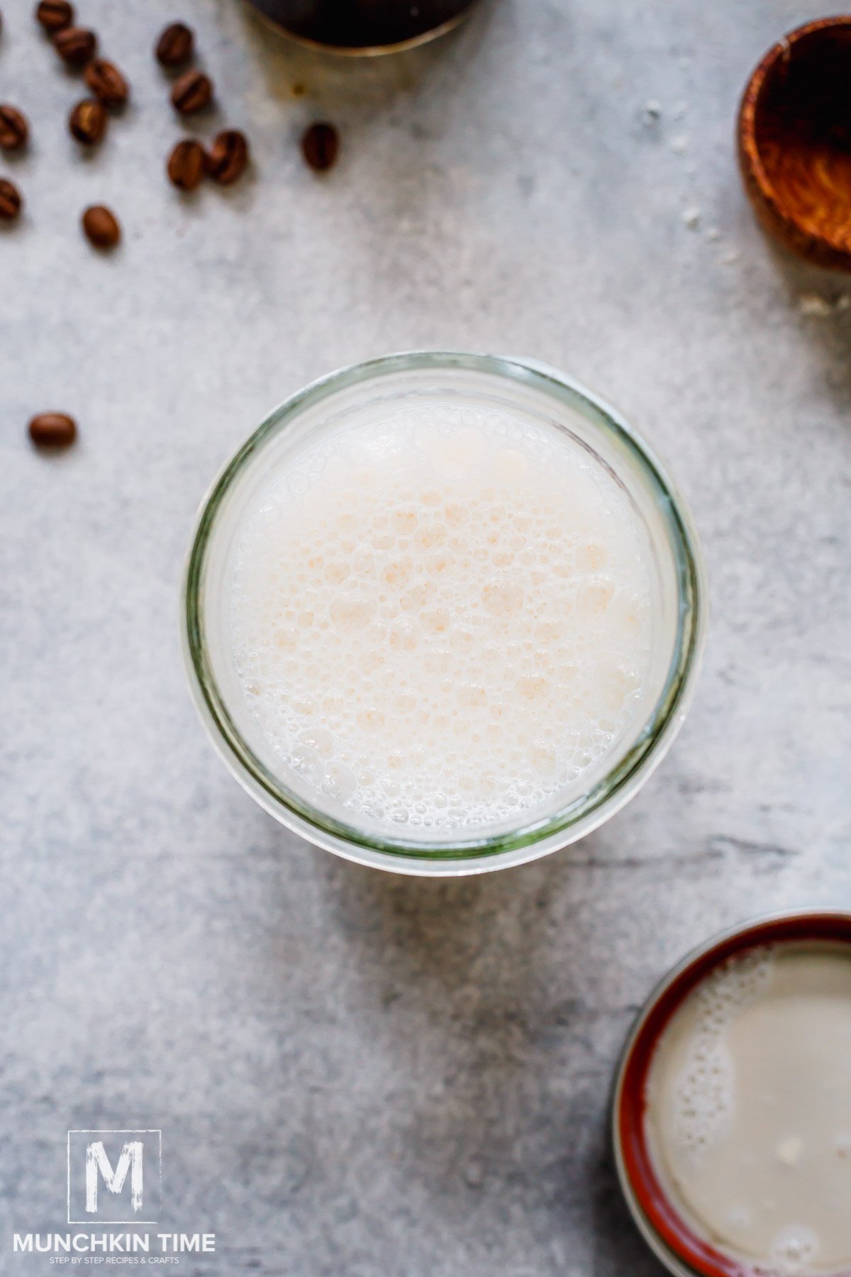 mixed milk with vanilla protein powder in mason jar.