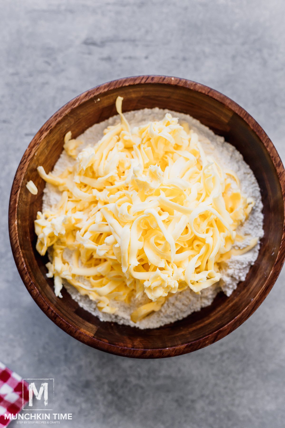 butter is graded into the bowl with flour mixture.