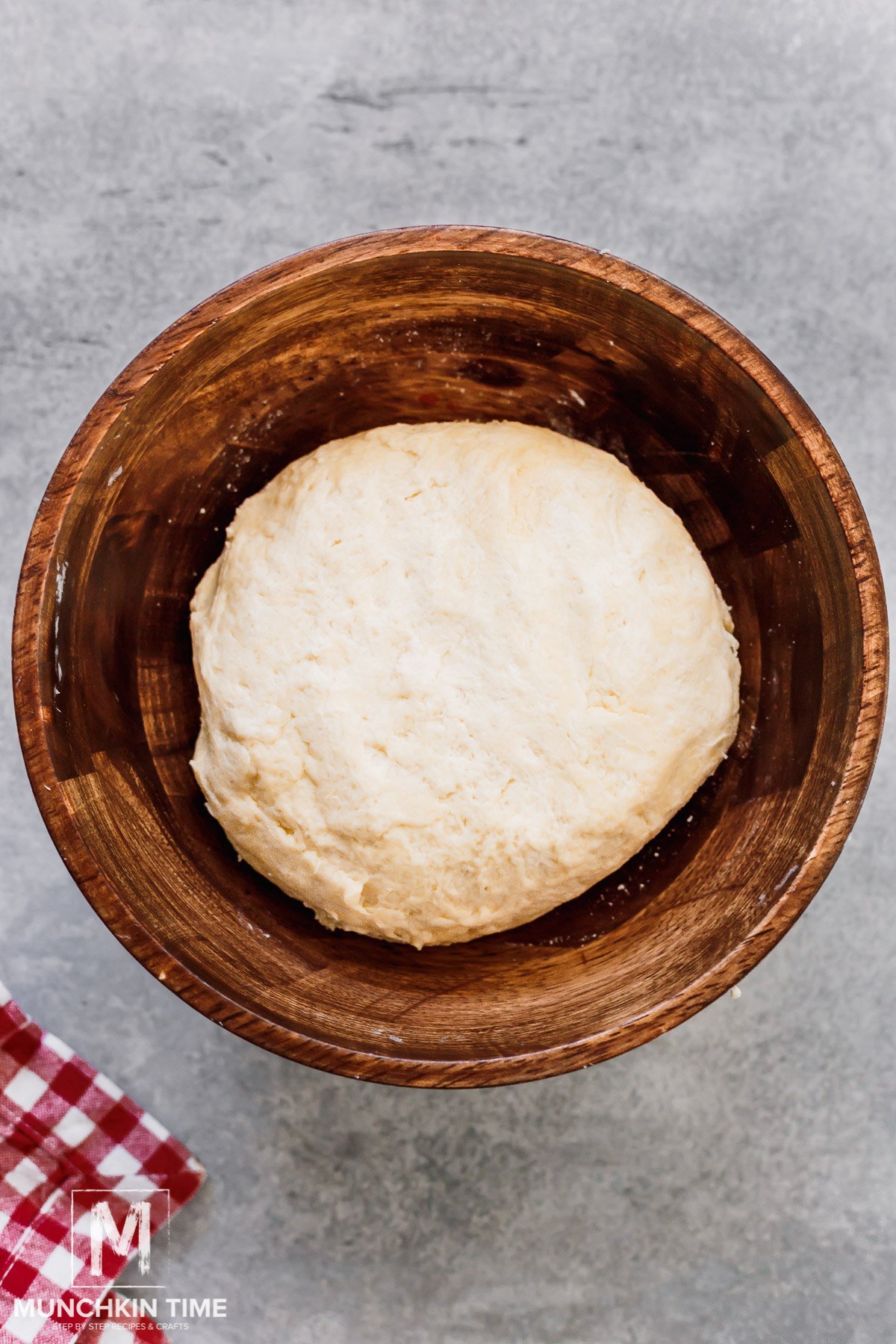 a dough ball formed after mixing sourdough discard with flour and butter mixture.