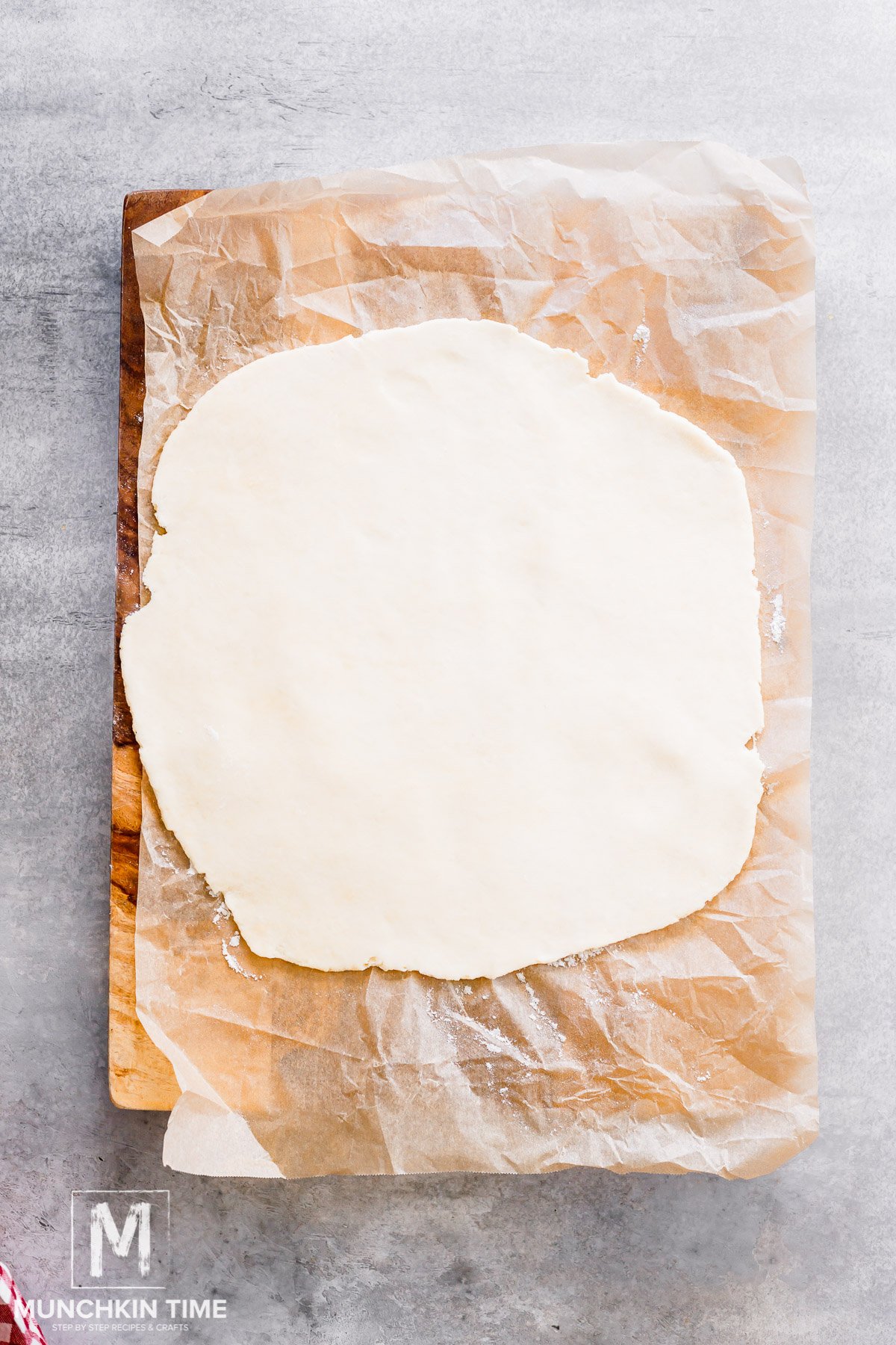 Galette dough rolled out into a big circle.