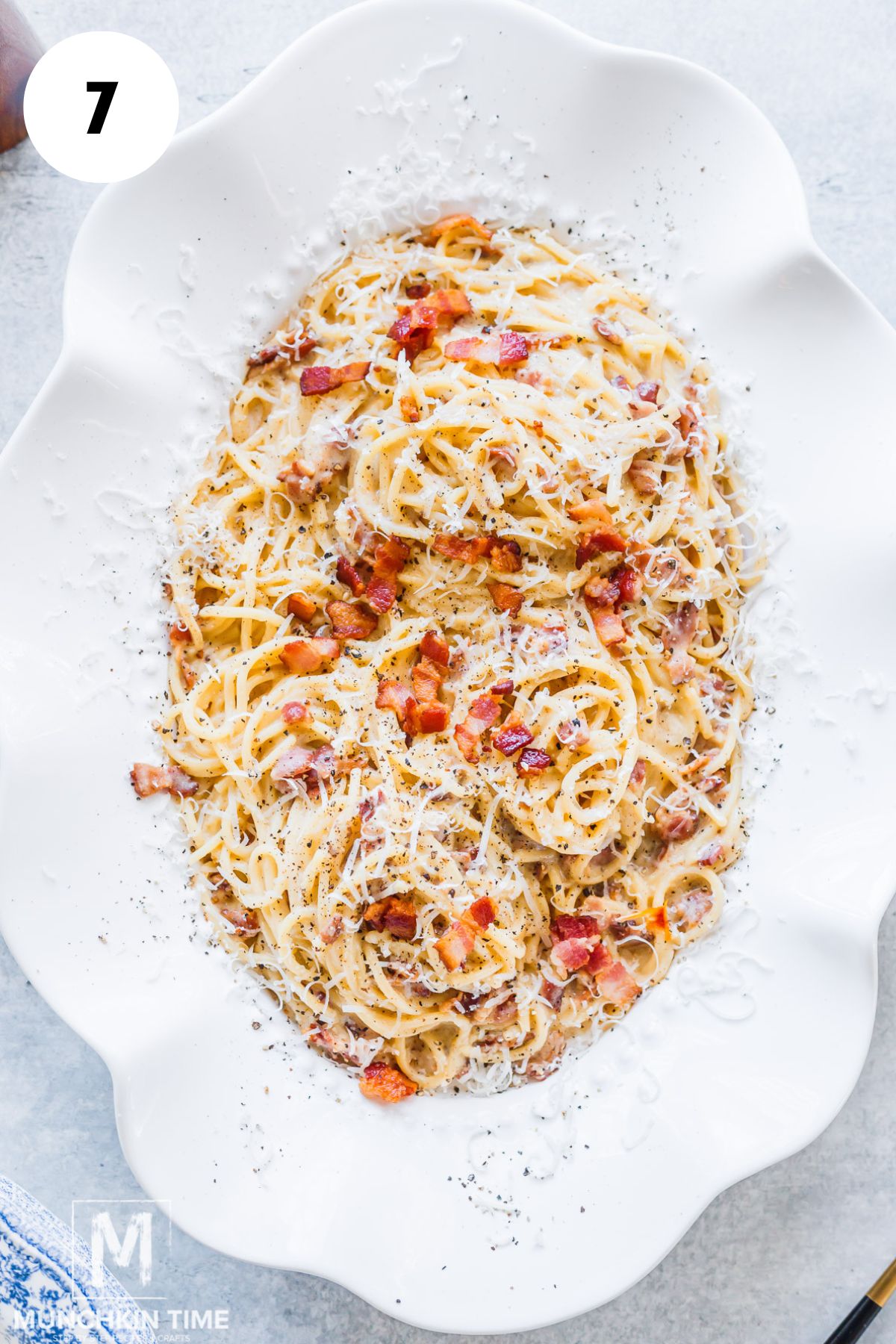 Delicious Pasta Carbonara served in a big white platter.