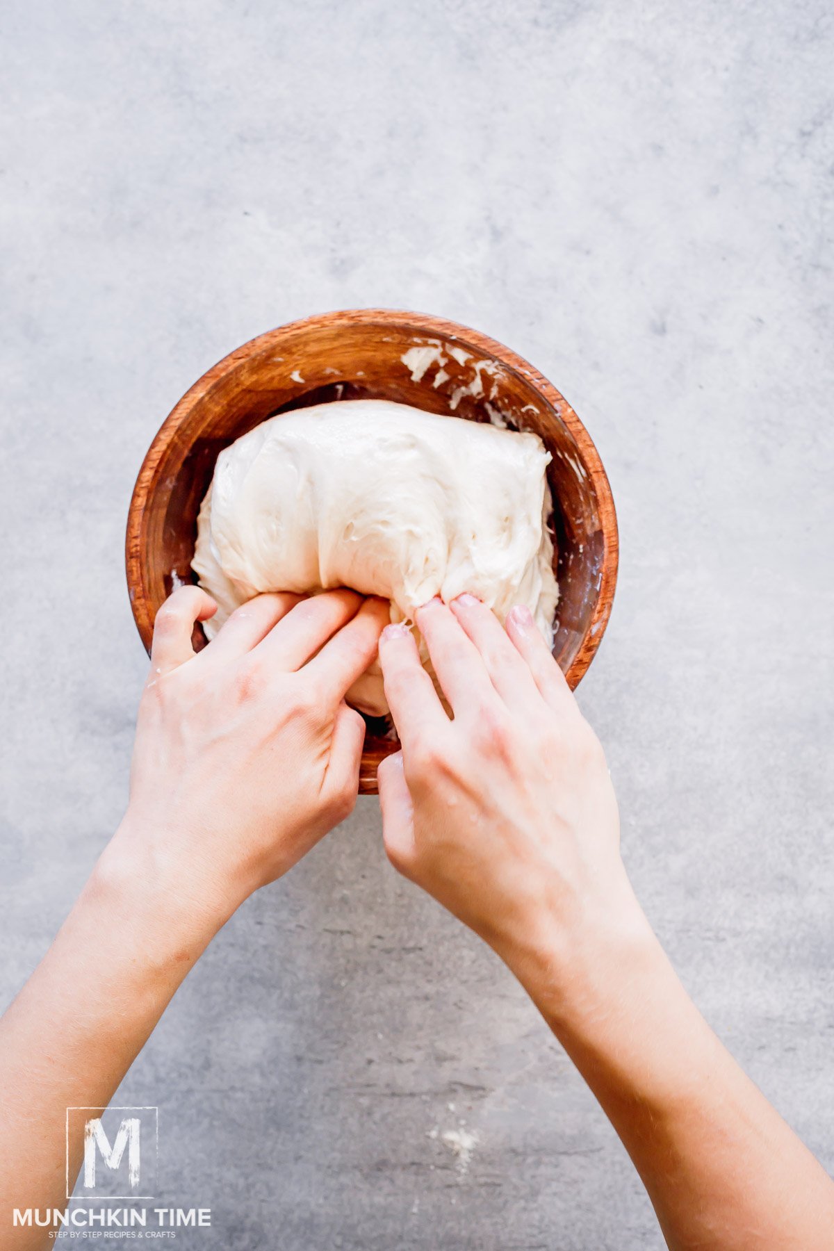 the pulled dough is folded in halve.