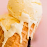 Homemade vanilla bean ice cream in a waffle cone.